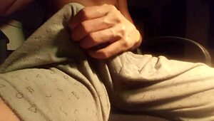 hot guy moaning while jerking his big cock in pajamas