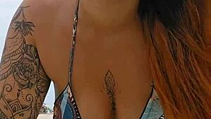 Young african woman flashes panties on beach to seduce married men