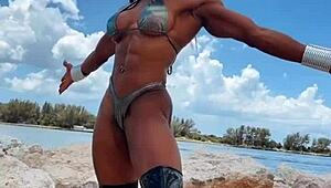 erotic hot female muscle babe fbb 13 flexes her body