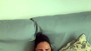 Tattooed brunette plays with dildos in tight pussy