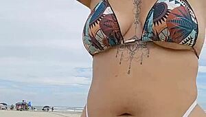 Young african woman flashes panties on beach to seduce married men