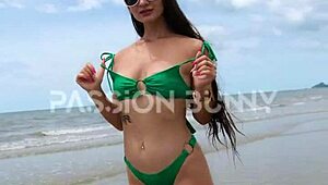 Sexy babe flashes and walks on public beach