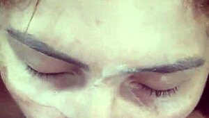 The huge husband commands his wife to kneel and suck his massive cock while admiring her big ass.