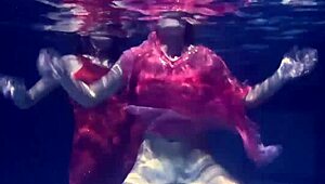 Lilia Mihalkova and Natalia Kupalka underwater lesbians