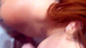 The huge husband commands his wife to kneel and suck his massive cock while admiring her big ass.