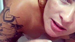 The huge husband commands his wife to kneel and suck his massive cock while admiring her big ass.