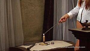 the sensual lesbian madame kisses and fingers her blindfolded slave in a bdsm scene