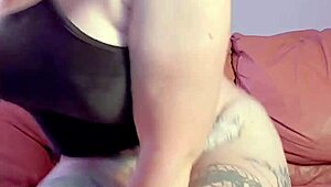 she slides a huge dildo deep into her hairy, wet pussy