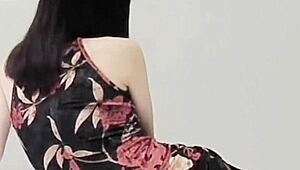 Young Brunette in Sexy One-Piece Swimsuit Pose