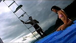 a natural exotic beauty gets wild riding anal on a boat rocking on the waves, passionate and outdoor.