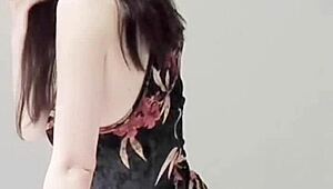 Young Brunette in Sexy One-Piece Swimsuit Pose