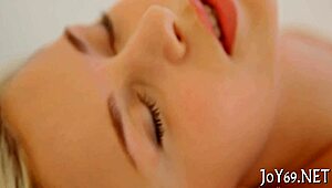 Teen cutie in softcore session, using dildo for masturbation and fingering