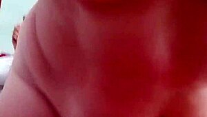 mature woman gives intriguing handjob during massage session