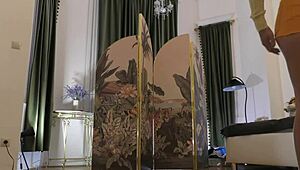 Beautiful brunette tries on sexy lingerie backstage