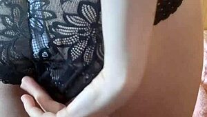 Bold ebony whore fingers her pussy while bound in bondage