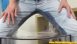 Piss Fetish Babe Pees Through Denim Pants
