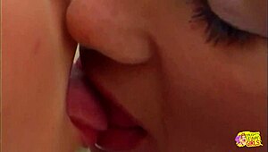 big nipples get very hard as a lesbian pinches them and cums