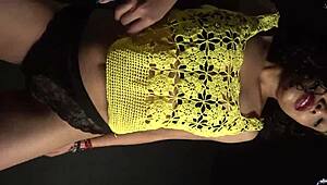 moving butt and hips to the rhythm of the music sexy outfit and long nails