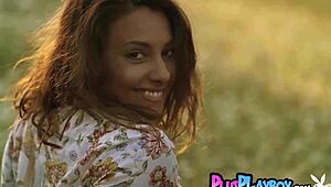 anetta keys poses naked in grass, enjoying hot posing