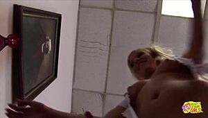 Blonde in red stockings enjoys brunette licking her shaved pussy and asshole