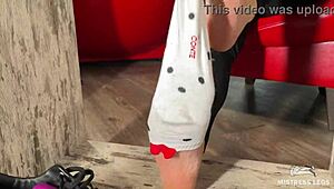 Goddess Plays with Feet in Socks and Barefoot Under Table