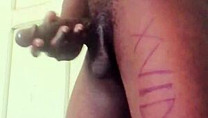 The guy is jerking his big monster cock