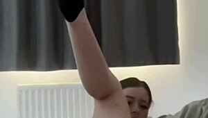 British girl enjoys solo toy play