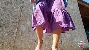 i love this kinky milf mommy playing with her pierced pussy and nipples outdoors