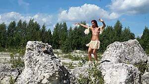Topless dance in white stone quarry?