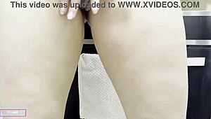 Gothic beauty passionately inserts toy into her wet pussy