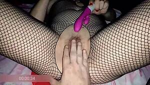 This 40-year-old housewife shows off her hairy pussy in fishnet stockings for foot fetish fun