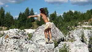 Topless dance in white stone quarry?