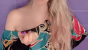 Blonde Woman With Long Hair And Nails In Fetish Scene