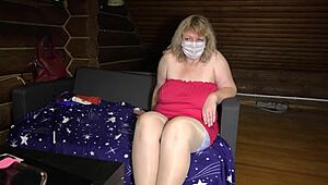 Mature housewife chats sexily, showing chubby legs in stockings and big ass.