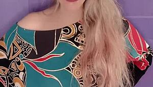 Blonde Woman With Long Hair And Nails In Fetish Scene