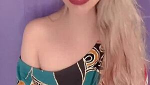 Blonde Woman With Long Hair And Nails In Fetish Scene