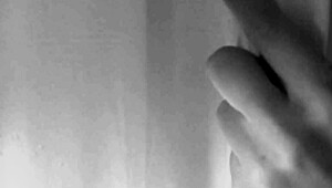 Sexy brunette enjoys a relaxing shower bath