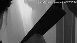 Sexy brunette enjoys a relaxing shower bath