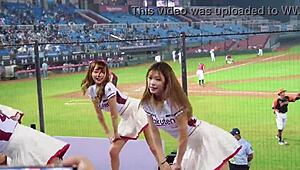 Cheerleaders dancing for baseball game