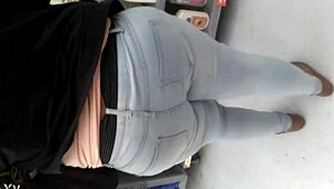 i am filming this chubby girl at the supermarket, she is walking the aisles and picking groceries