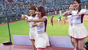 Cheerleaders dancing for baseball game