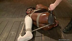Bound Ebony Participant Undergoes Discipline In Restrictive Bondage Setup