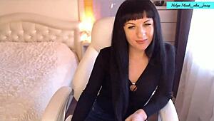 Helga Muah aka Jessy teases, strips, caresses clit, and fingers on chair