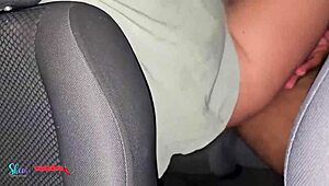 The husband watches his wife mingle at the group gathering in the car