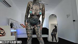 milf tries on bikini with led butt plug