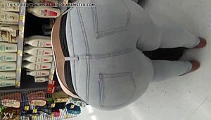 i am filming this chubby girl at the supermarket, she is walking the aisles and picking groceries