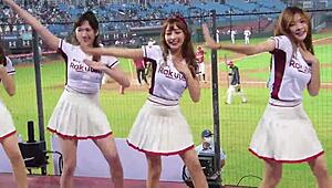 Cheerleaders dancing for baseball game