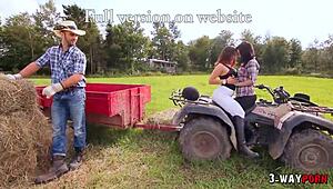 two babes get fucked by ranch boy in outdoor 3-way