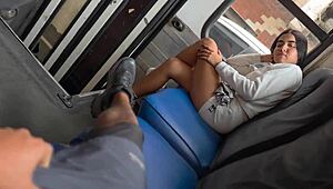 A couple enjoys a ride on the public bus and checks into a hotel.