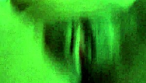 Cute ebony girl rips clothes in sexy stockings striptease while masturbating sensually.